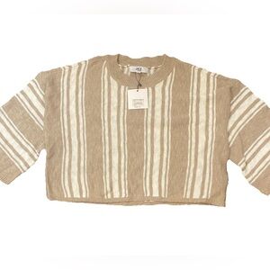 Tan and white sweater